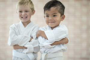 2 Kids in White Karate Uniforms